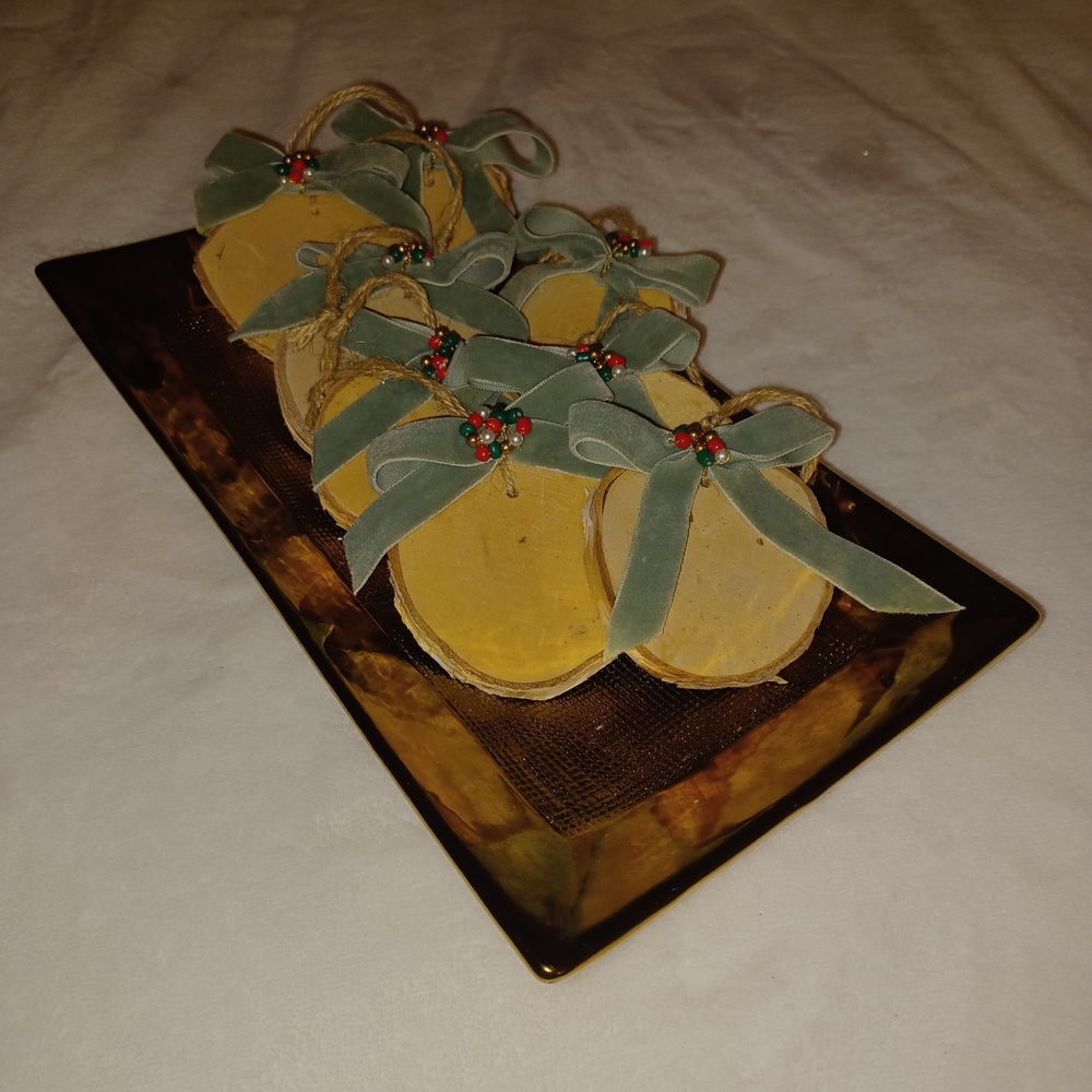 Festive Wooden Ornaments with Green Bows